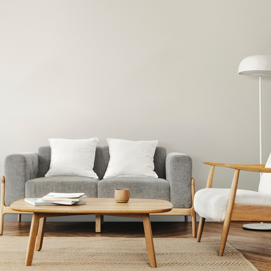 Como decorar uma sala de estar pequena para a fazer parecer maior